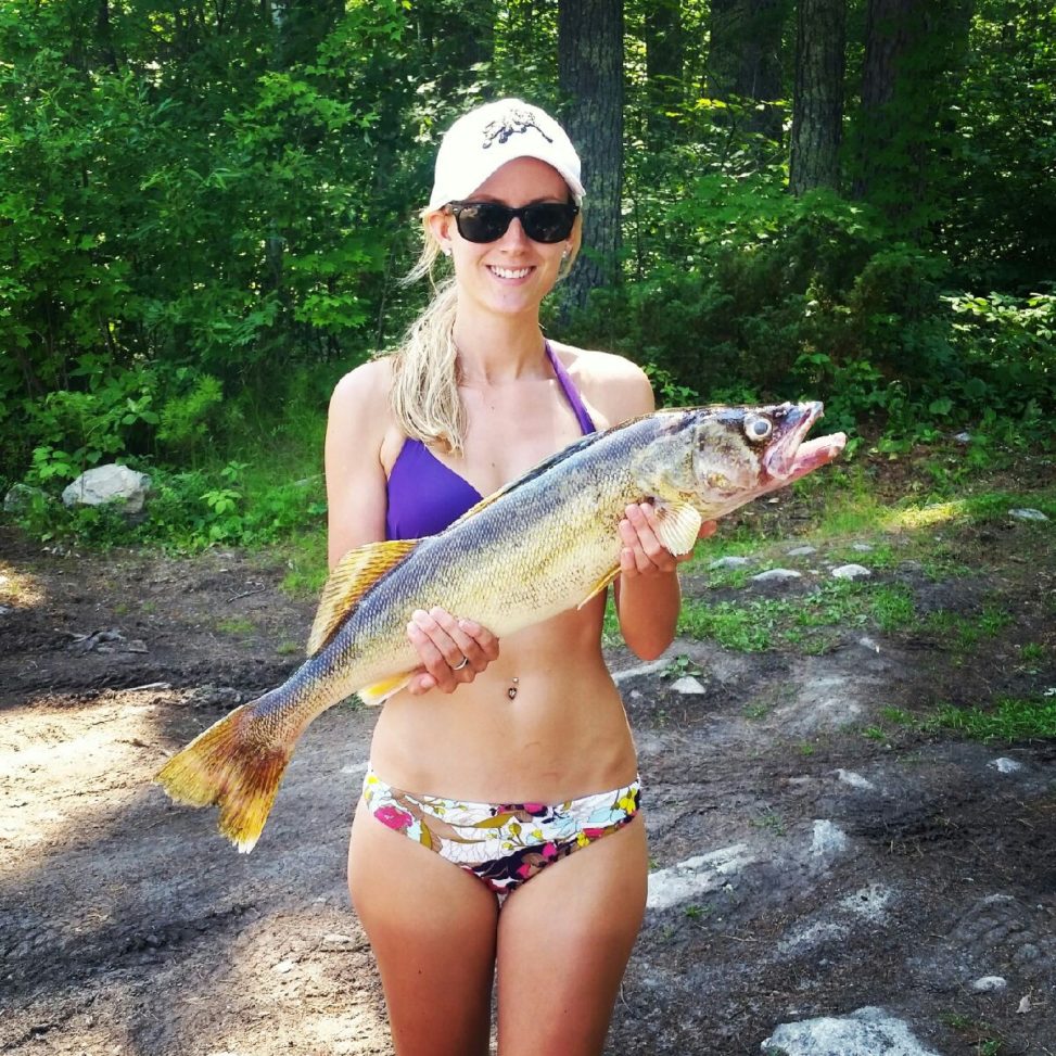 Hot Blonde in Bikini with Fish